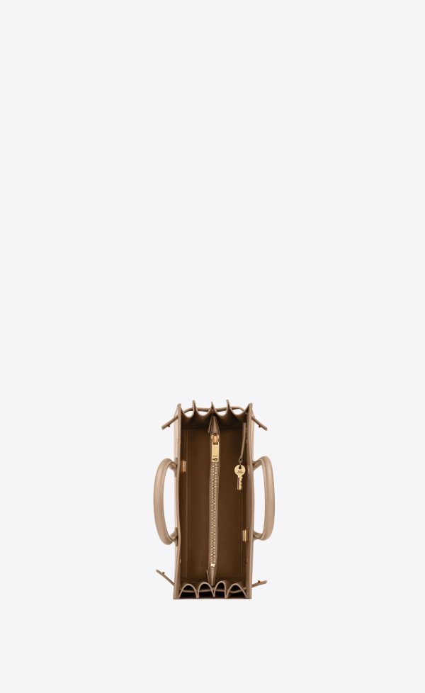 sac de jour baby in smooth leather dark beige