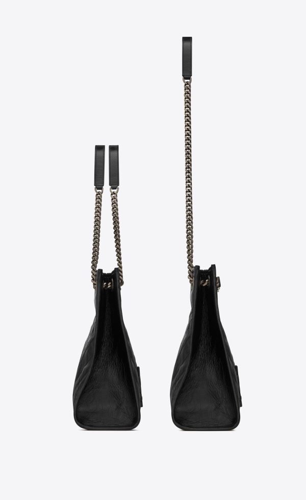 niki shopping in vintage leather black