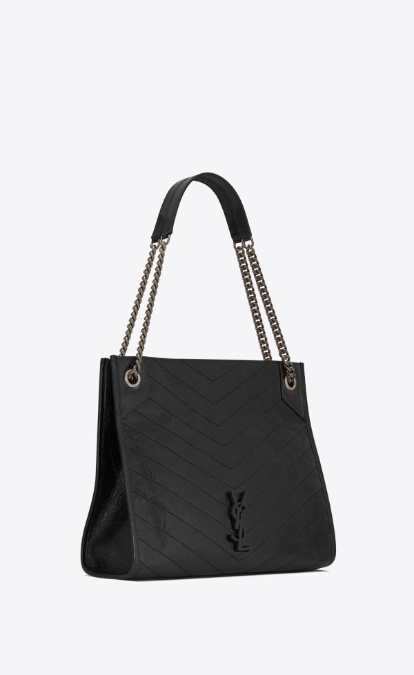 niki shopping in vintage leather black