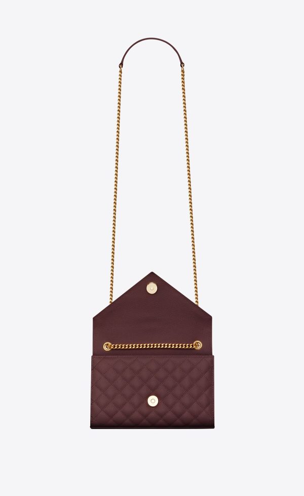 small envelope in quilted grain de poudre embossed leather rouge legion