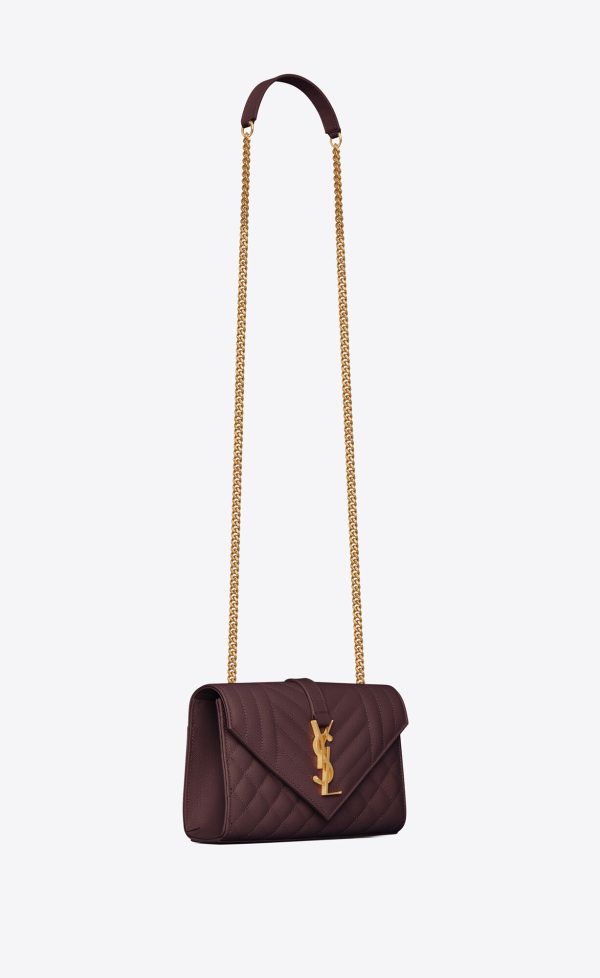 small envelope in quilted grain de poudre embossed leather rouge legion