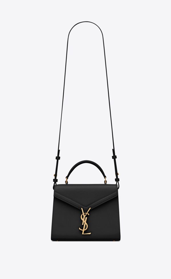 cassandra mini top handle bag in grain de poudre embossed leather black