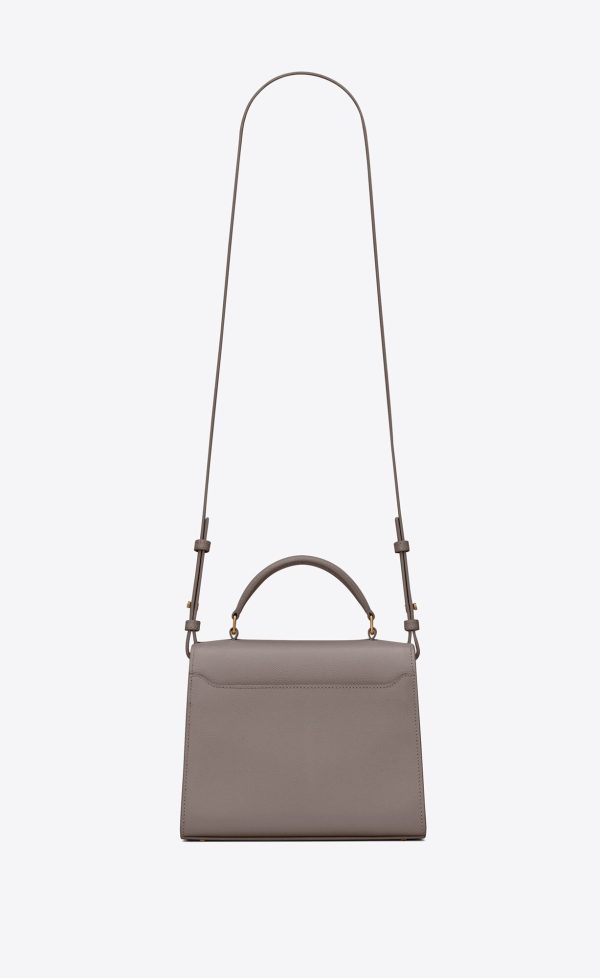 cassandra mini top handle bag in grain de poudre embossed leather fog