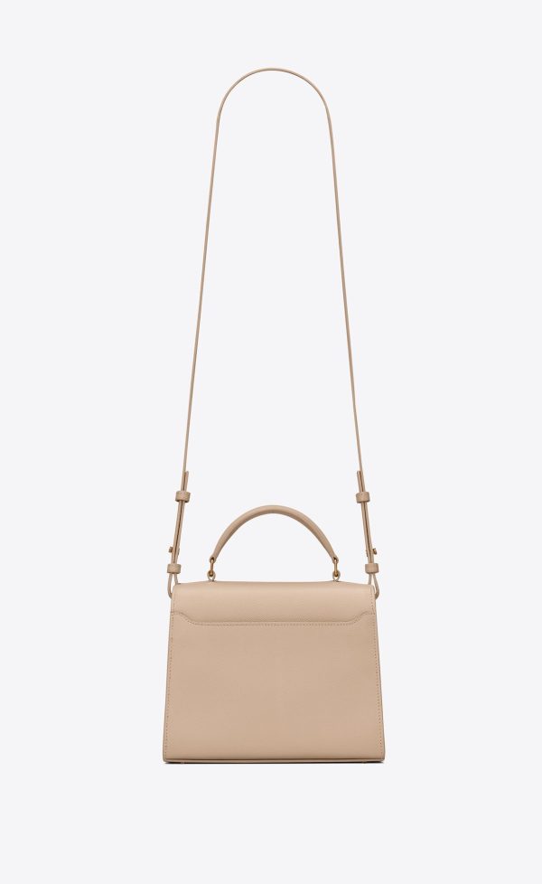 cassandra mini top handle bag in grain de poudre embossed leather dark beige