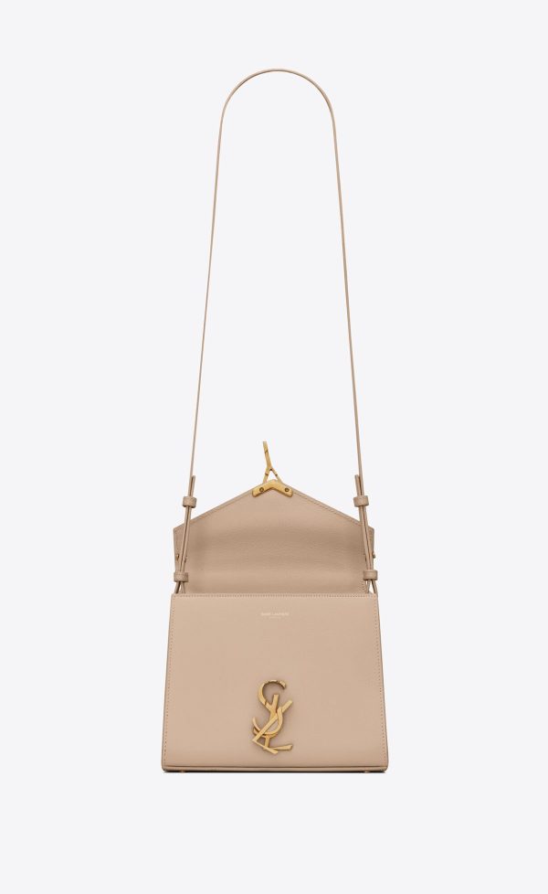 cassandra mini top handle bag in grain de poudre embossed leather dark beige