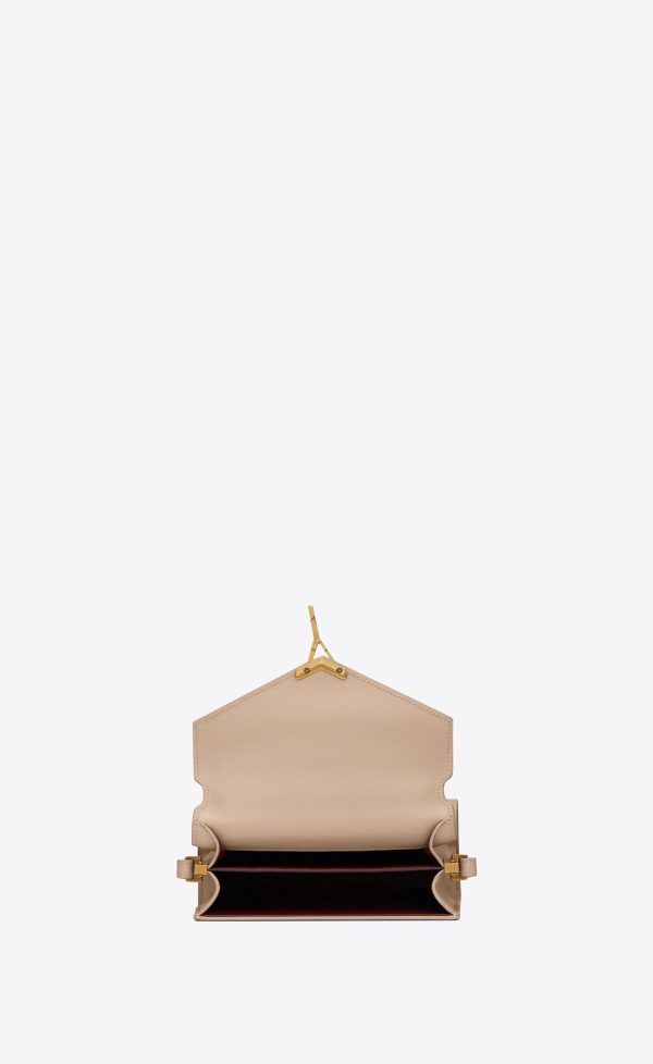 cassandra mini top handle bag in grain de poudre embossed leather dark beige
