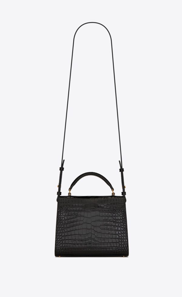 cassandra mini top handle bag in crocodile embossed shiny leather black