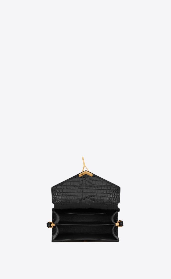 cassandra mini top handle bag in crocodile embossed shiny leather black