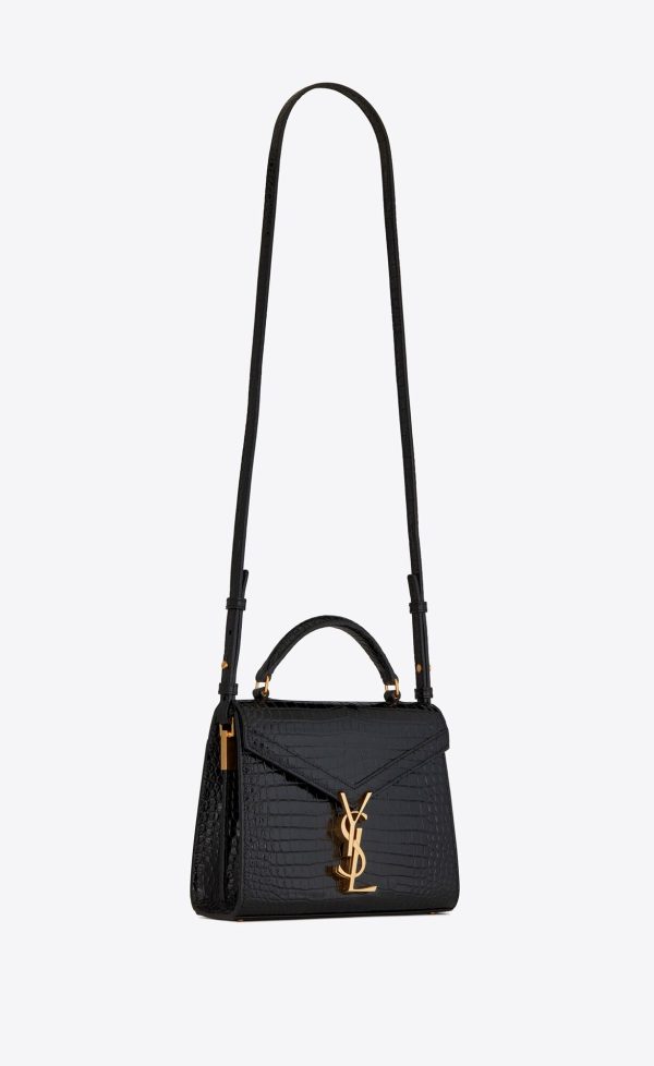 cassandra mini top handle bag in crocodile embossed shiny leather black