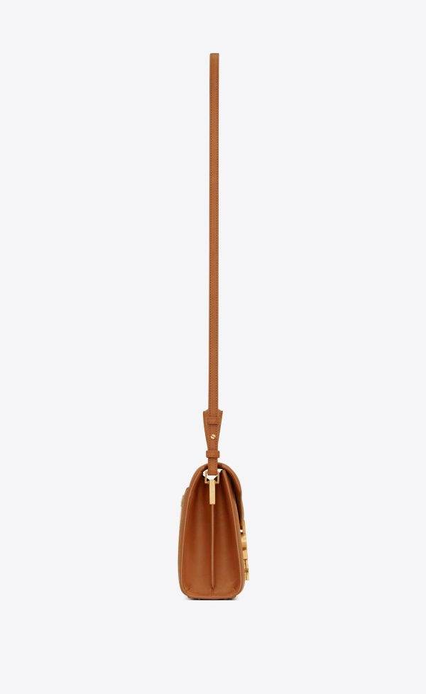 cassandra mini top handle bag in raffia and vegetable tanned leather natural sand and brick