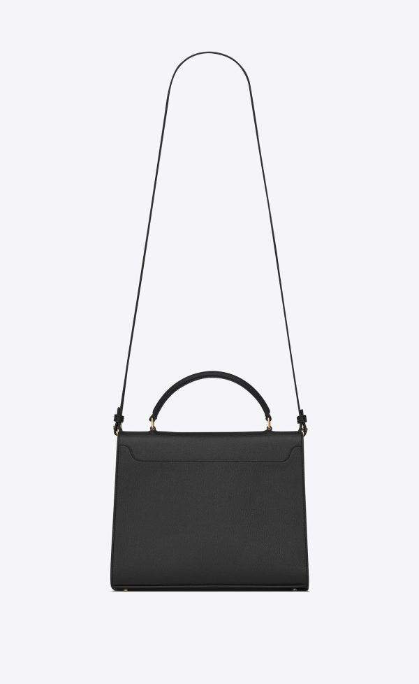 cassandra medium top handle bag in grain de poudre embossed leather black