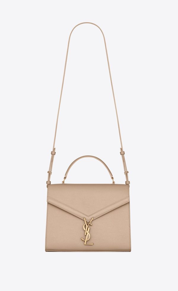cassandra medium top handle bag in grain de poudre embossed leather dark beige