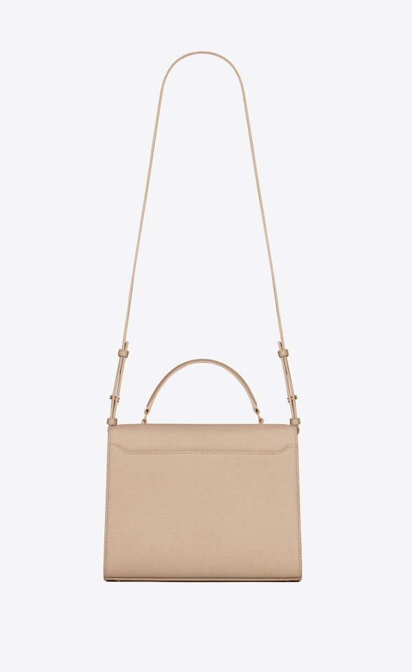 cassandra medium top handle bag in grain de poudre embossed leather dark beige