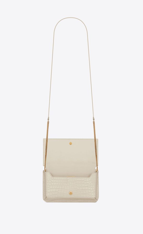 cassandre phone holder with strap in shiny crocodile embossed leather blanc vintage
