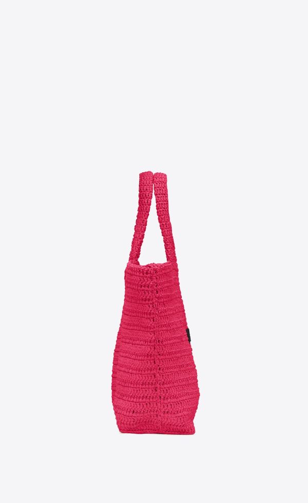 rive gauche tote in raffia neon pink and black