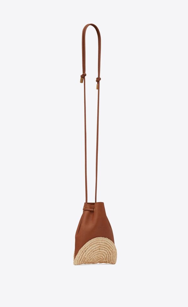 cassandre mini pochon in raffia and leather brick and natural