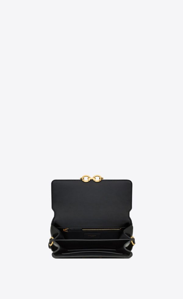 le maillon in quilted shiny leather black