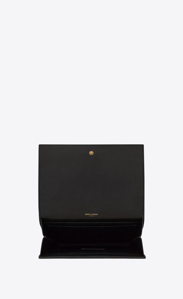 cassandre matelassé carré flap pouch in quilted leather black