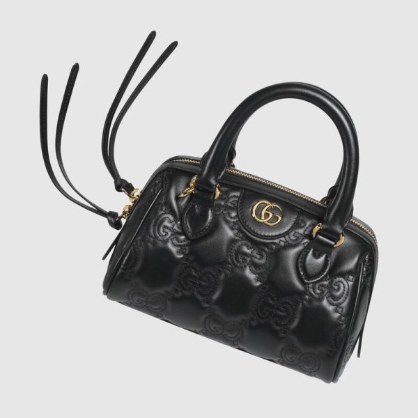 gg matelassé leather top handle bag