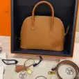 hermès 1923 bolide 25 en desordre gold epsom gold hardware hermès 1923 bolide 25 en desordre gold epsom gold hardware